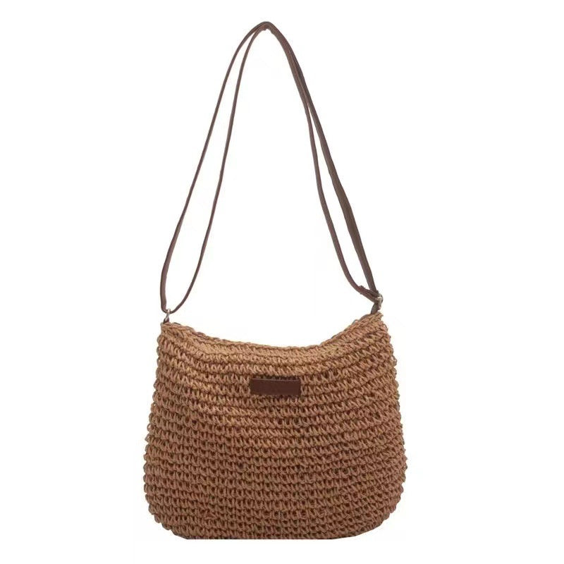 Hand-knotted shoulder bag with leather accents Skanto