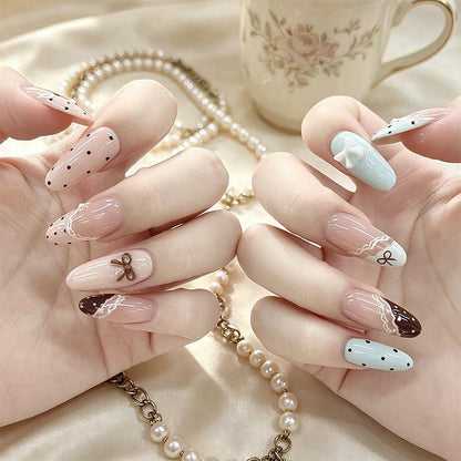 Artificial nail set with elegant accents and fine designs Acalora
