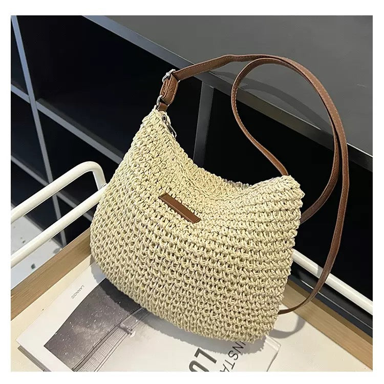 Handwoven shoulder bag with brown leather accent Skanto