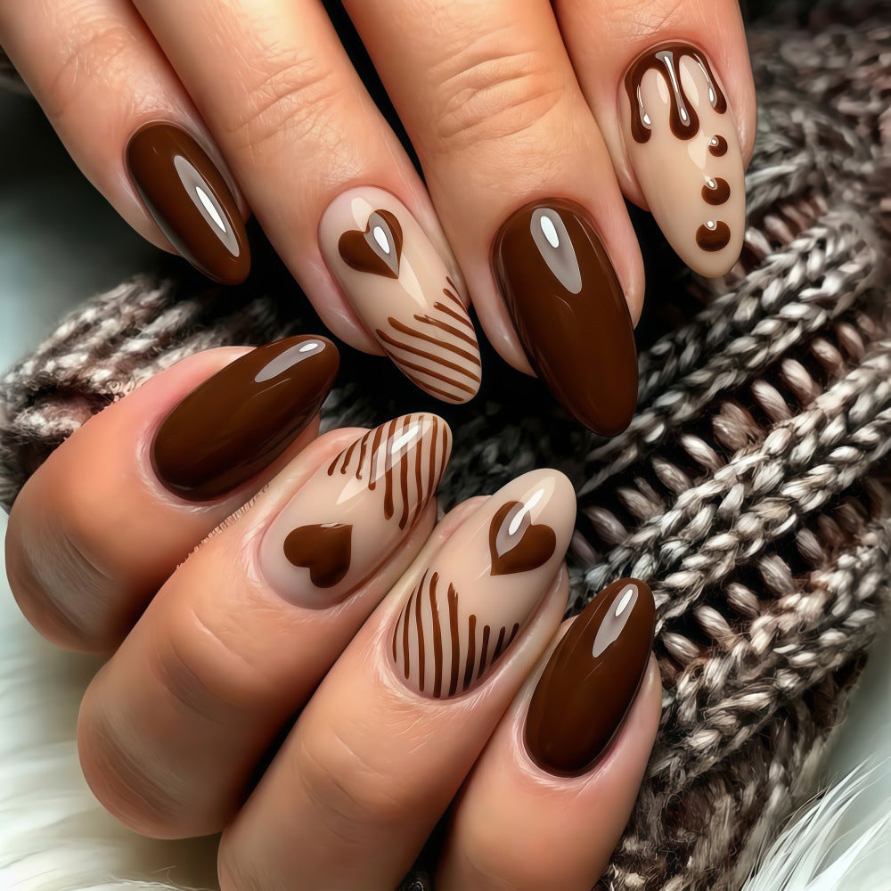 Artificial nails with creative heart and chocolate designs Acalora