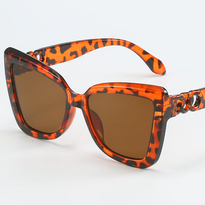Women's modern Cat-Eye sunglasses with clear frame and UV protection Karnz