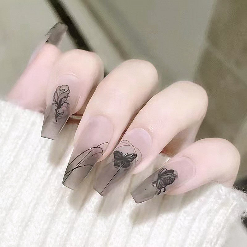 Artificial nail set with elegant flower design and delicate butterfly motifs Acalora