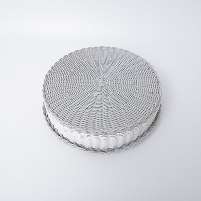 Handwoven storage basket with decorative edge