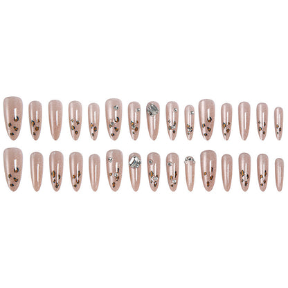 Glamorous artificial nail set with fun leopard pattern and glittering accents Acalora