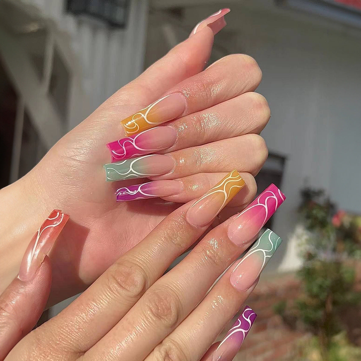 Artistic Press-On Nail Set with Gradient Swirl Designs Acalora