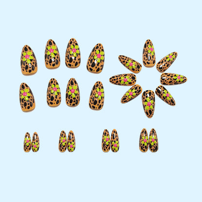 Artificial nails in modern animal patterns with floral accents Acalora