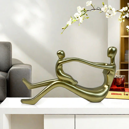 Stylish sculpture with intertwined figures Acalora