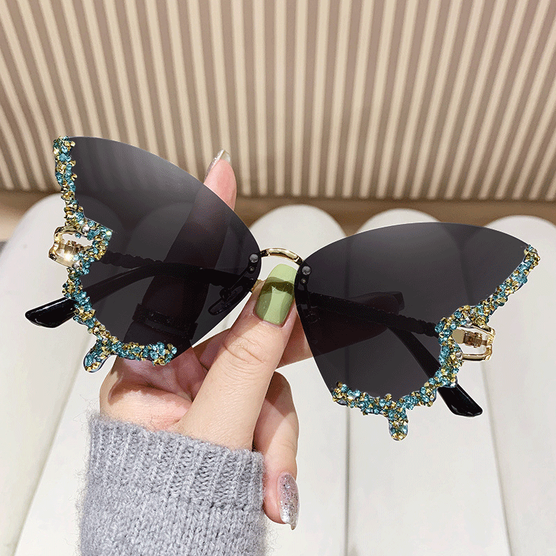 Women's extravagant sunglasses with sparkling butterfly design Kalsten