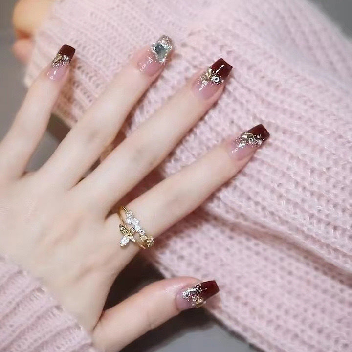 Artificials nails with glitter embellishments and elegant accents Acalora