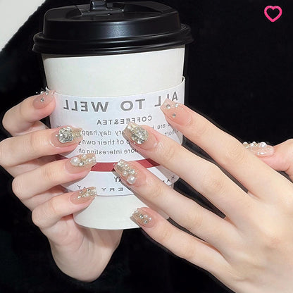 Artificial nail set with elegant pearl and glitter design Acalora