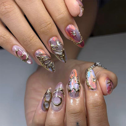 Acrylic nail set with glamorous 3D designs and elegant gold accents Acalora