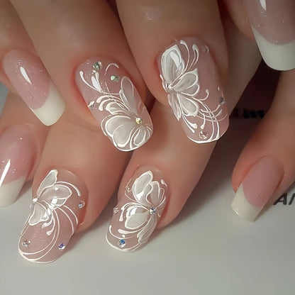 Artificial nail set with delicate flower and glitter decoration Acalora