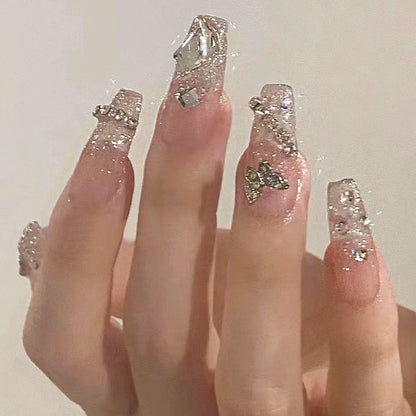 Glamorous artificial nails with sparkling rhinestones and elegant designs Acalora