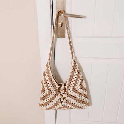 Women's handbag with intricate woven pattern Karnz