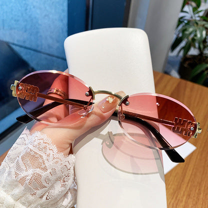 Women's fashionable sunglasses in an elegant oval design Karnz