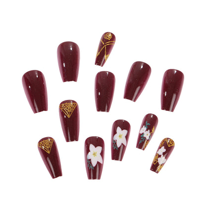 Trendy artificial nails with floral accents Acalora