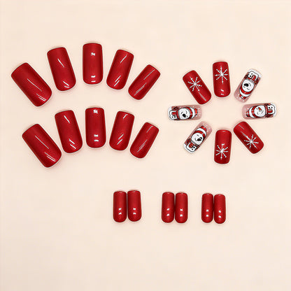 Artificial nail set with festive snowman design and glitter accents Acalora