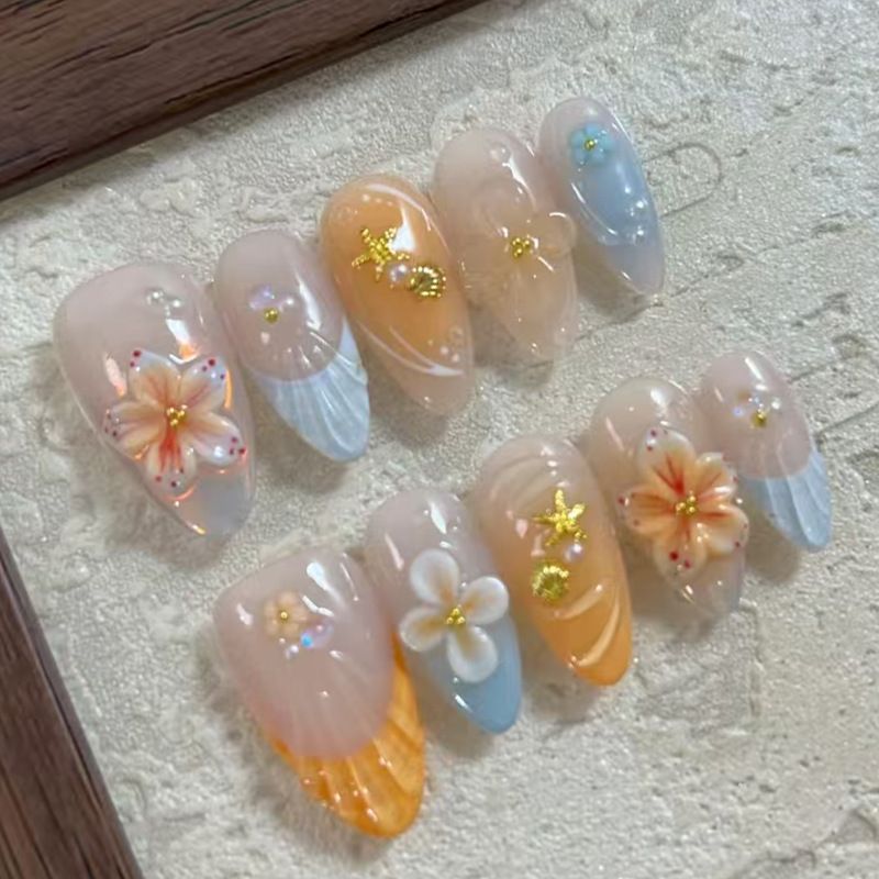 Nail art set with floral patterns and ombre effects Acalora