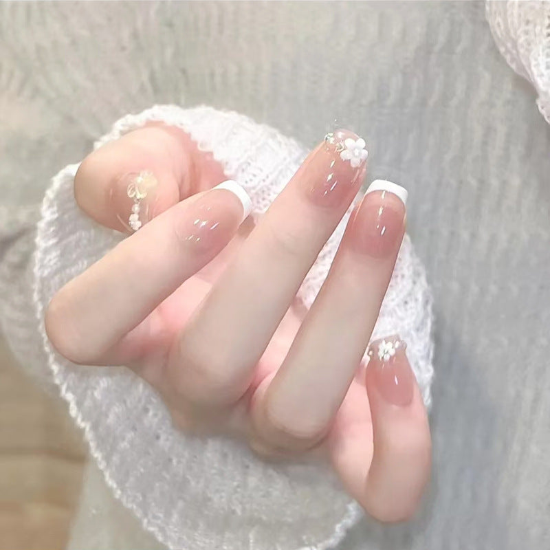 Nail set with elegant flower appliqués and exquisite glitter embellishments Acalora