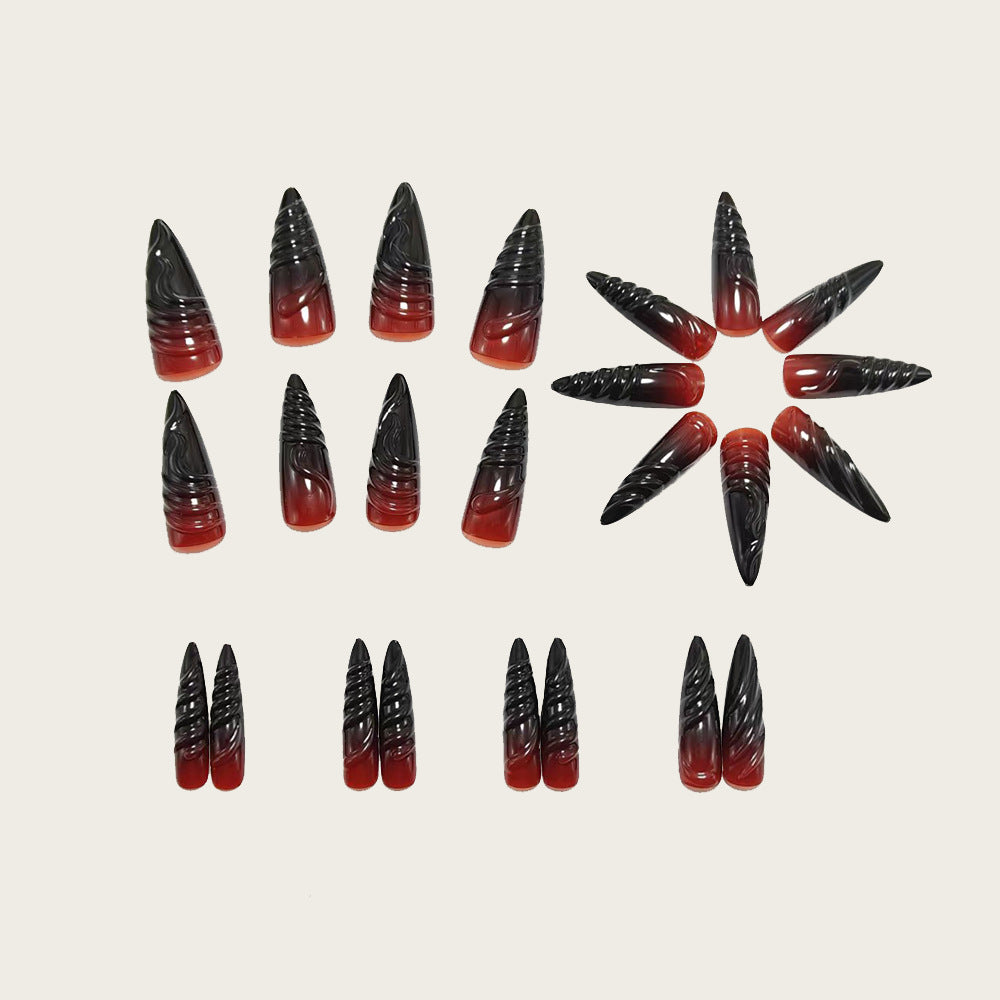 Gothic-style artificial nails with pointed tips and shiny surface Acalora