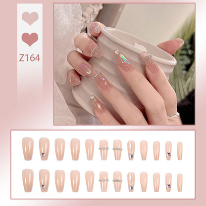 Acrylic nail set with glamorous rhinestone and glitter elements Acalora