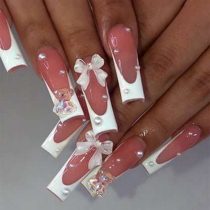 Artificial nail set with elegant bow and pearl decorations Acalora