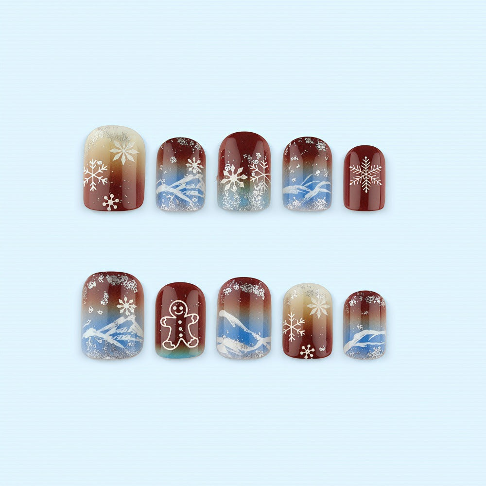 Artificial nails with festive snowflake and gingerbread motif Acalora