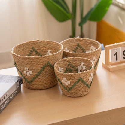 Handwoven storage basket with colorful accents Acalora
