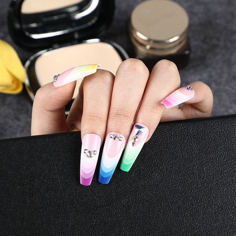 Artificial nails in luxurious ombre design with rhinestone accents Acalora