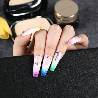 Artificial nails in luxurious ombre design with rhinestone accents Acalora