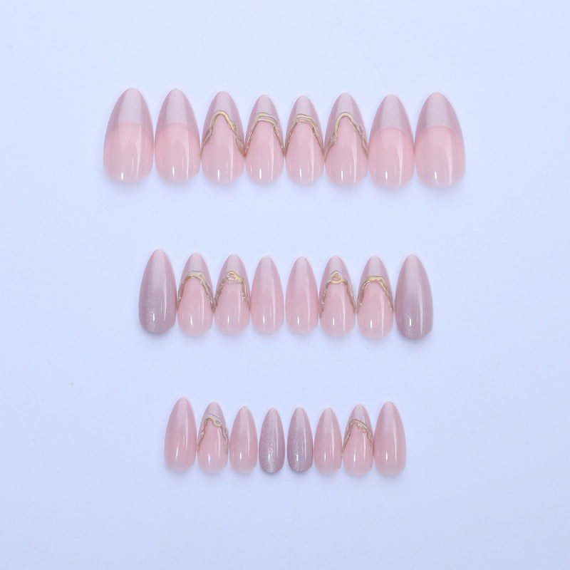Acrylic nail set with glamorous tips and golden accents Acalora