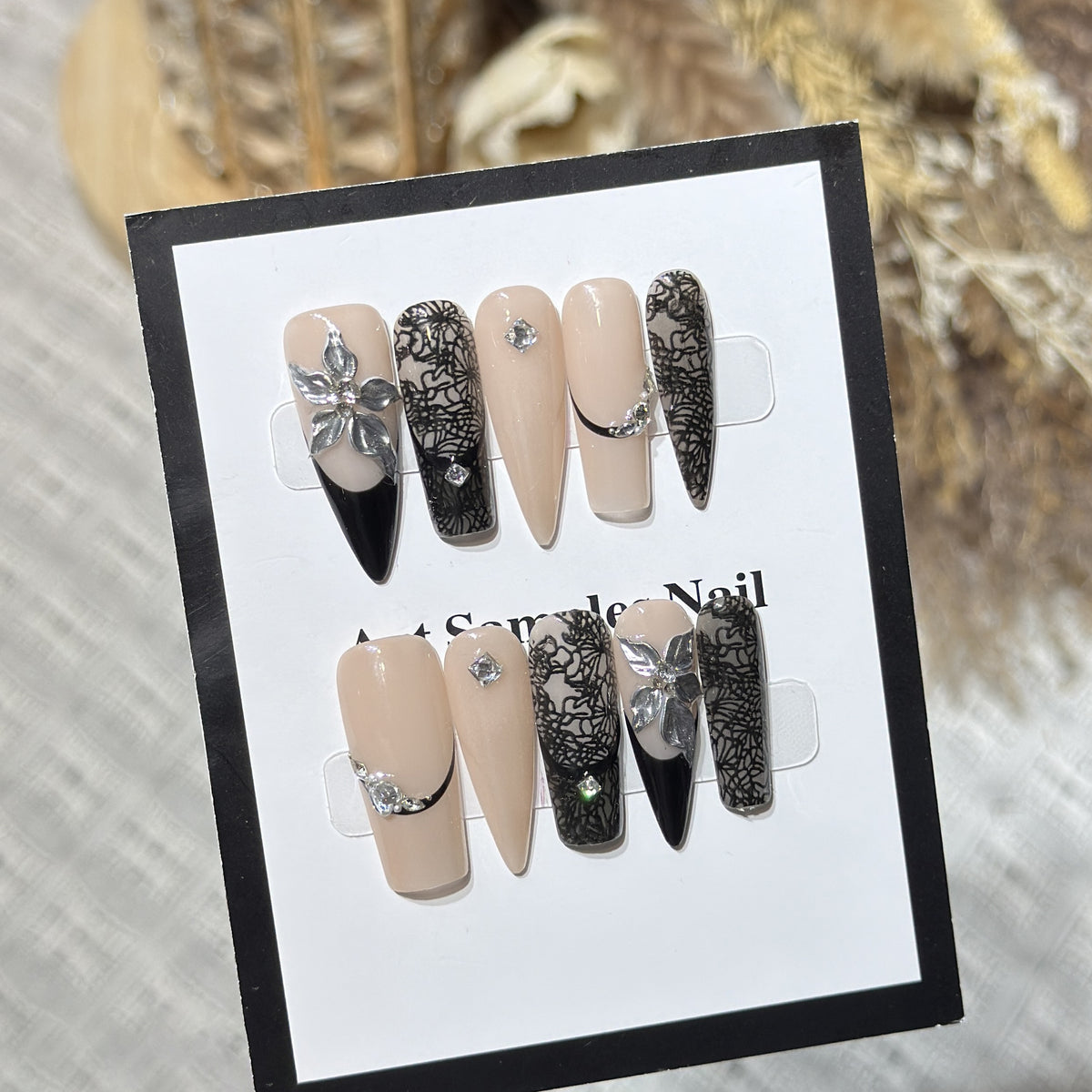 Artistic Stiletto Press-On Nail Set with Floral and Geometric Accents Acalora