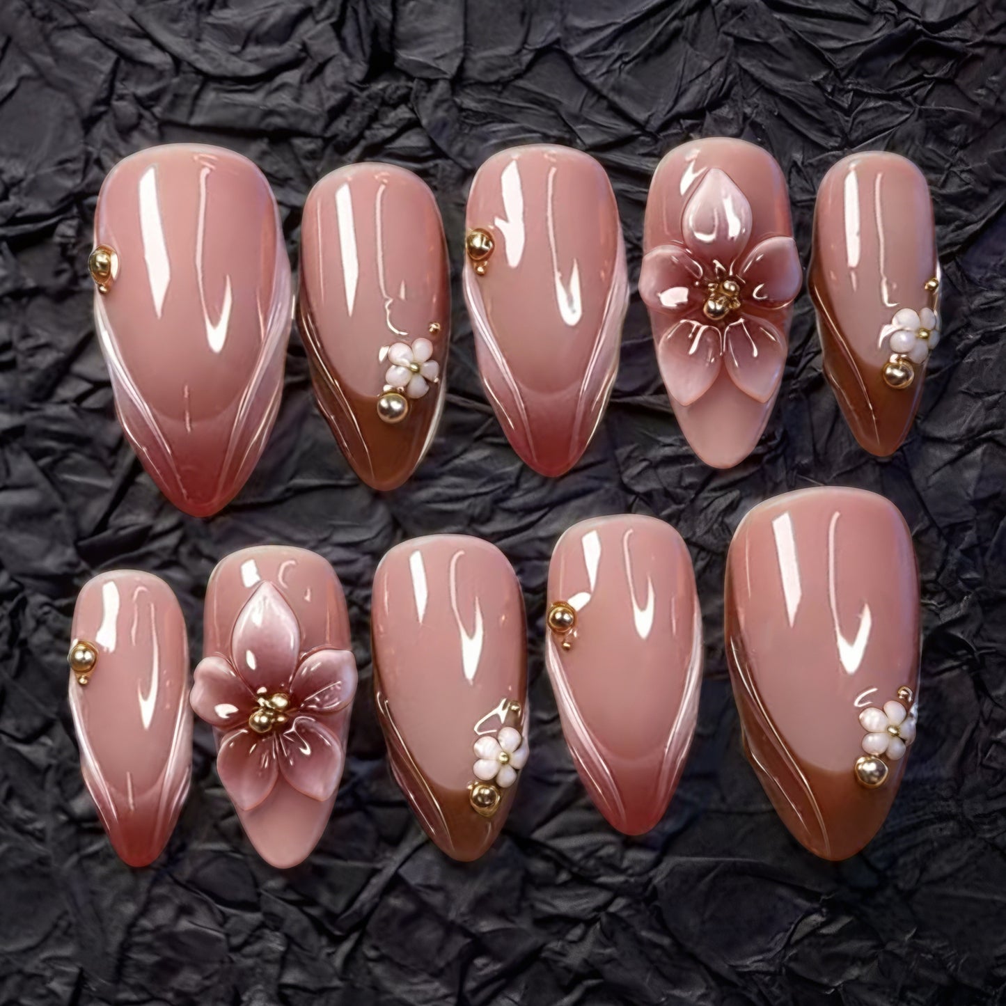 Artificial nail set with floral accents and gold embellishments Acalora