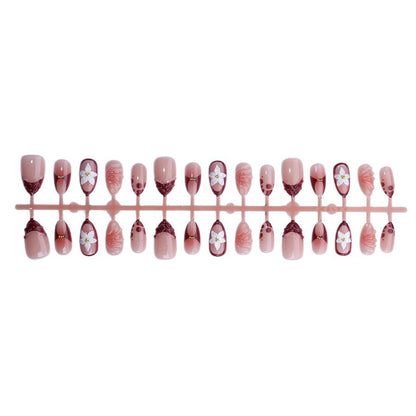 Artificial nail set with floral 3D applications and elegant gradient design Acalora