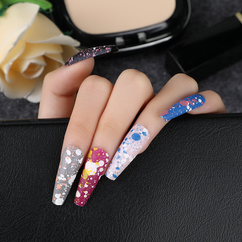 Artistic splatter design artificial nails Acalora