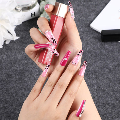 Artificial nails with floral and glittering accent Acalora