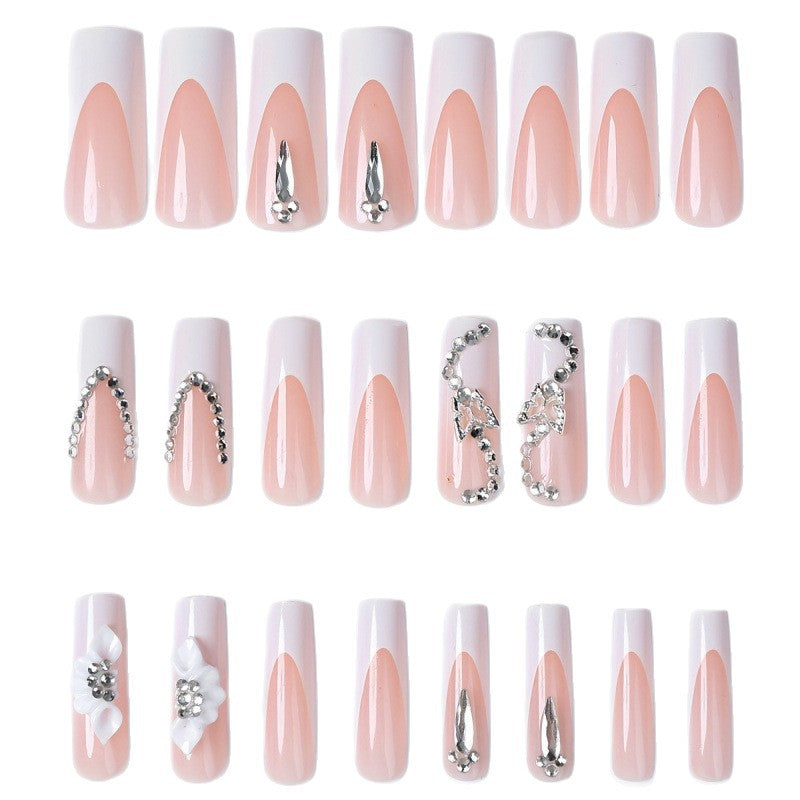 Nail set with elegant design and glitter accents Acalora