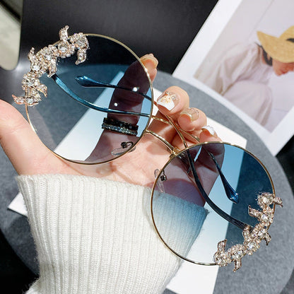 Women's fashion sunglasses with extravagant design and sparkling accents Bowlift