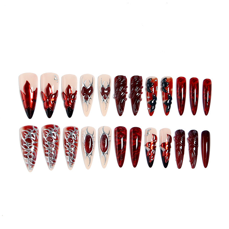 Artificial nail set with extravagant red and black designs Acalora