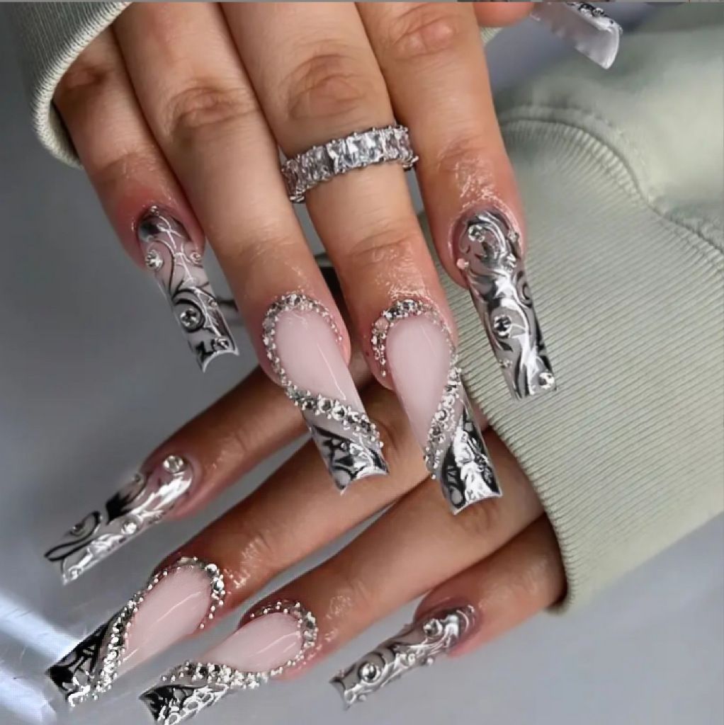 Acrylic nail set with elegant patterns and sparkling accents Acalora