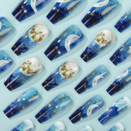 Dreamy artificial nails with moon and star design Acalora