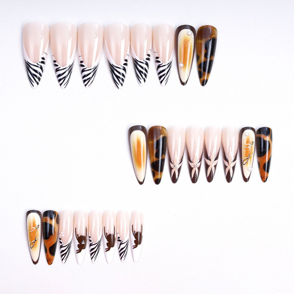 Artificial nails with elegant droplet and animal designs Acalora