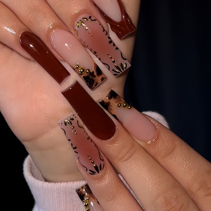 Artistic Long Press-On Nails with Elegant Gold Accents Acalora