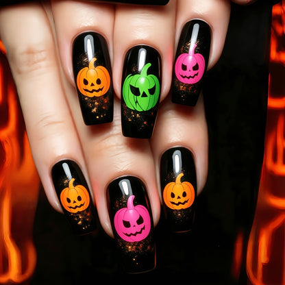 Halloween-style artificial nails with graphic pumpkin designs Acalora