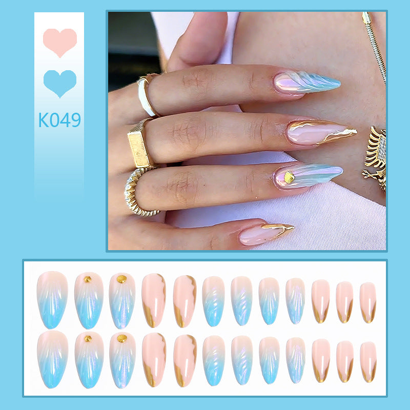 Acrylic nail set with glitter and shell design Acalora