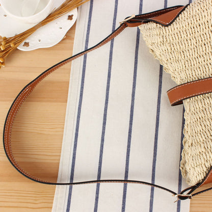 Braided shoulder bag with elegant leather accents Bowlift