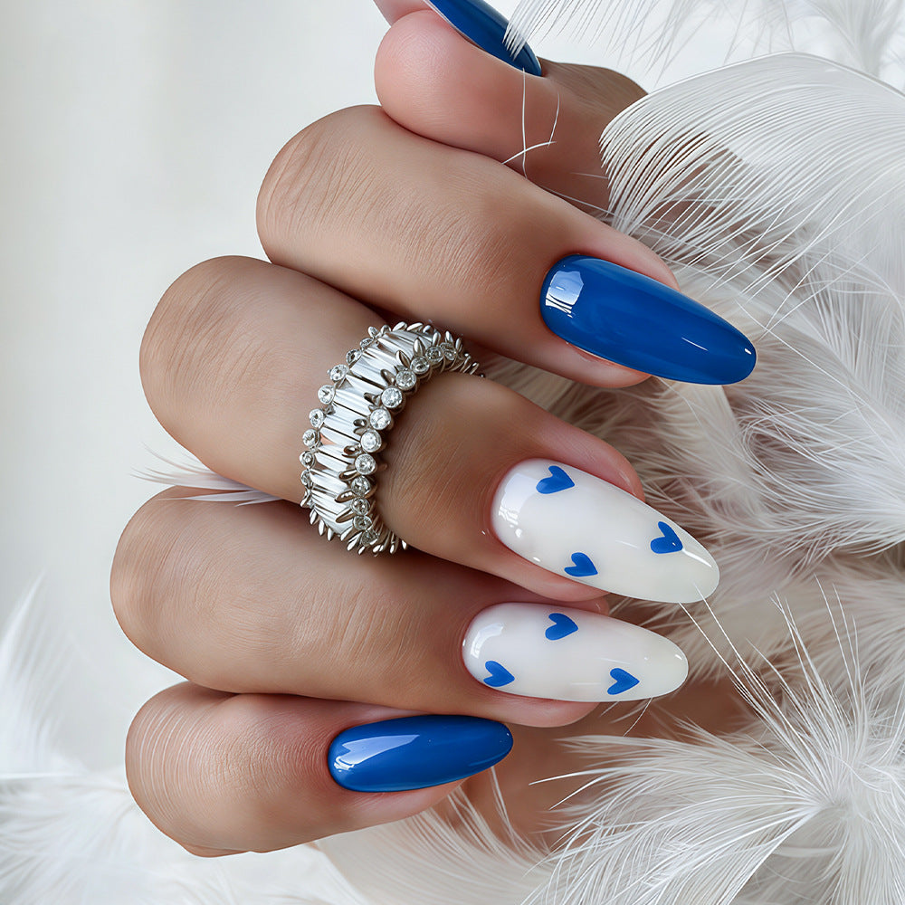 Stylish Long Stiletto Nail Art Tips with Heart Accents Acalora