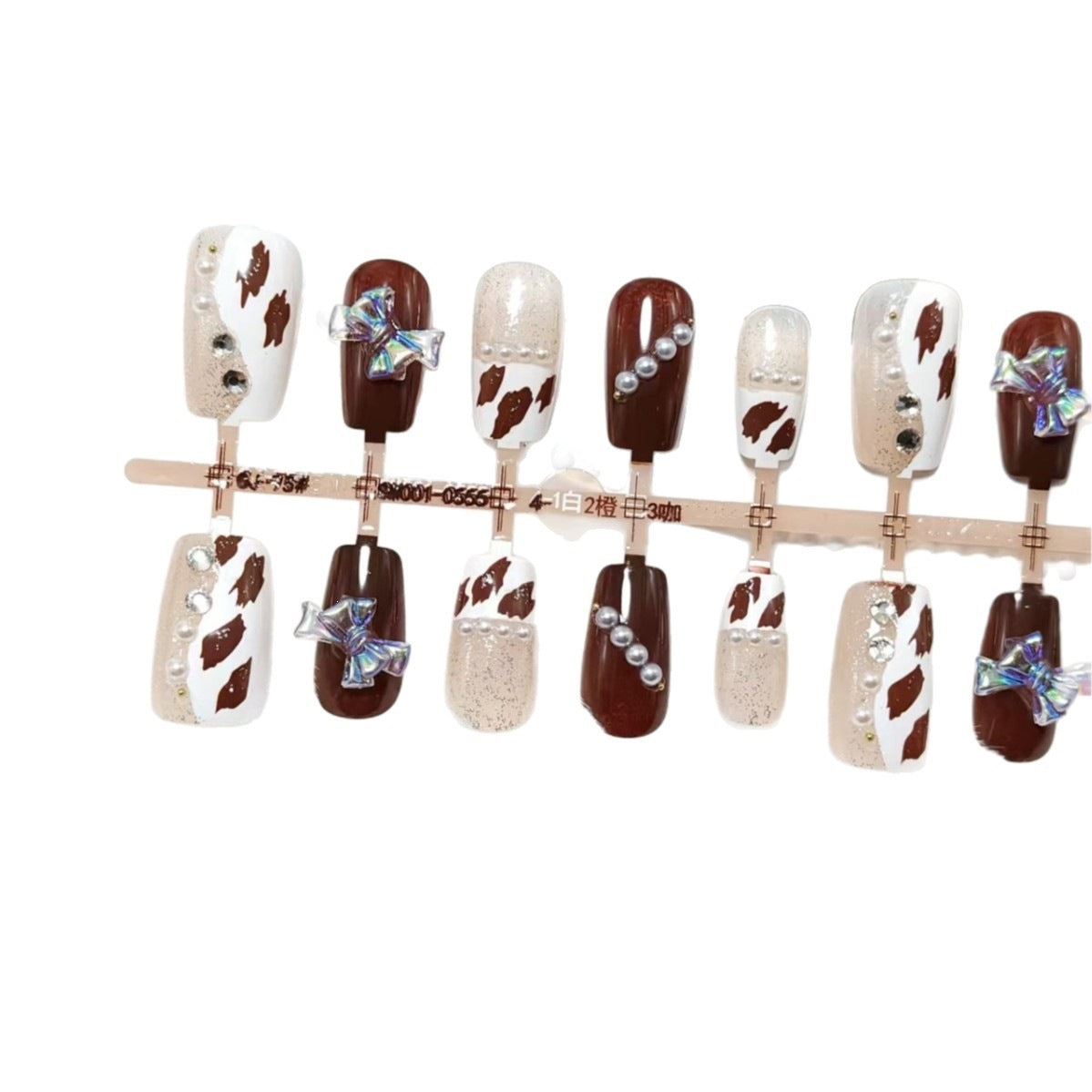 Artificial nails with sparkling rhinestone and bow accents Acalora