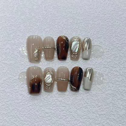 Elegant Nail Art Set with Unique Marble and Metallic Accents Acalora