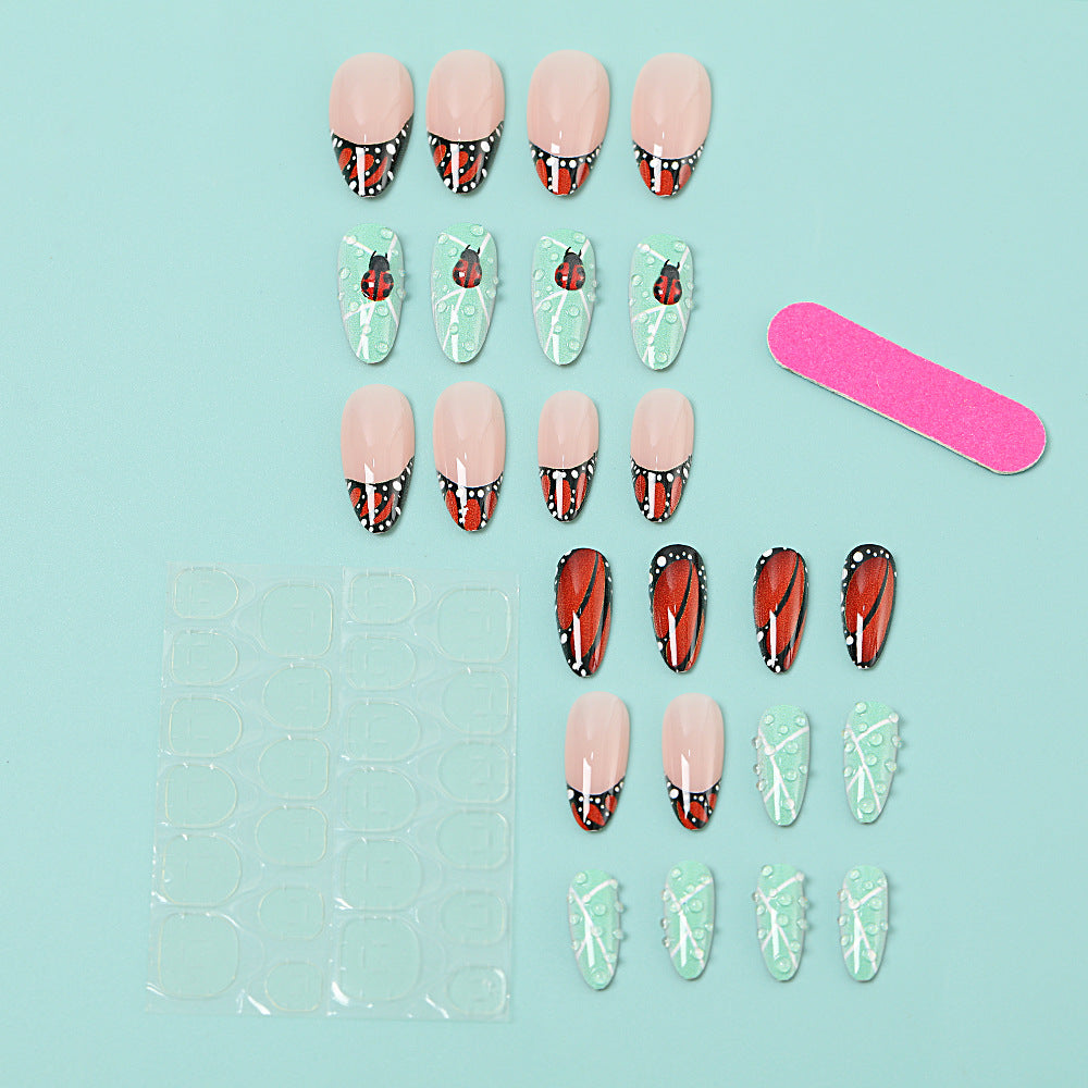 Creative nail art with elaborate butterfly and flower designs Acalora
